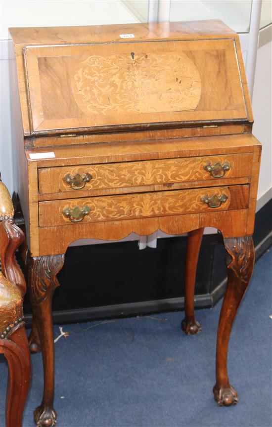 A 1930s marquetry inlaid walnut bureau W.52cm